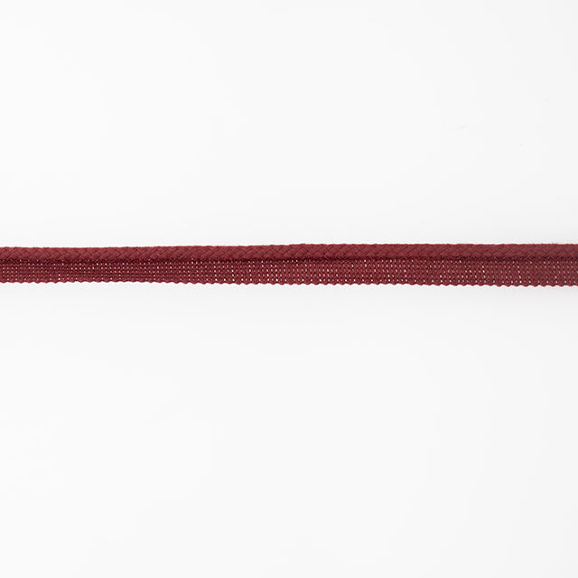Red upholstery flanged piping cord