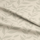 Beautiful cream-colored fabric featuring delicate leaf pattern