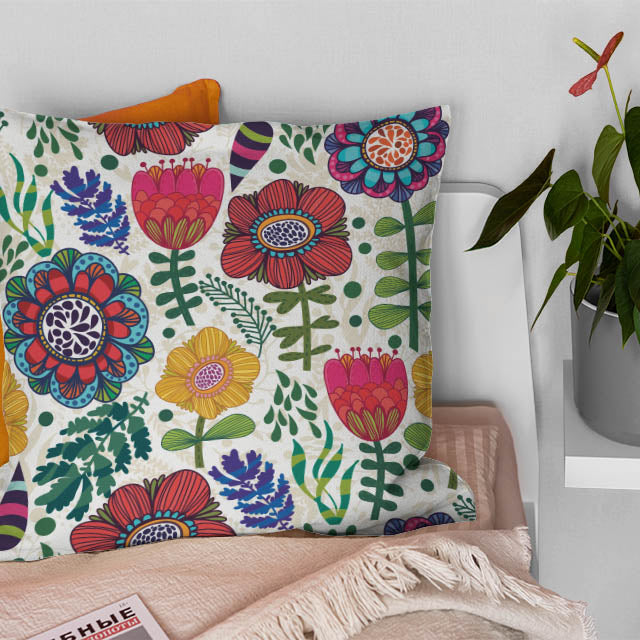 Colourful floral linen fabric used as a cushion cover – Folk Flowers Multi