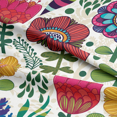 Folk Flowers multicoloured linen fabric draped to show pattern and texture