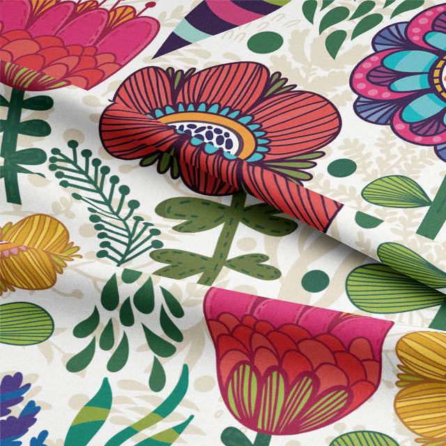 Folk Flowers multicoloured linen fabric draped to show pattern and texture