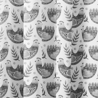 Grey curtain fabric featuring a delightful folk hen design