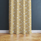 Beautiful Ochre Forest Friends Linen Curtain Fabric draping gracefully in a rustic living room