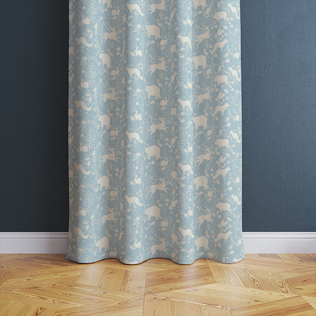 Beautiful sky blue linen curtain fabric featuring cute forest animal illustrations