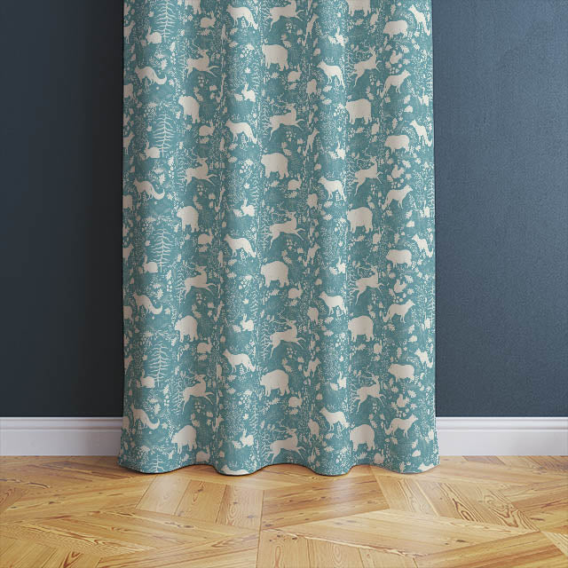 High-quality teal curtain fabric featuring cute forest animals perfect for nursery or playroom
