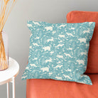 Teal linen fabric with charming forest creatures design, ideal for creating a whimsical woodland theme
