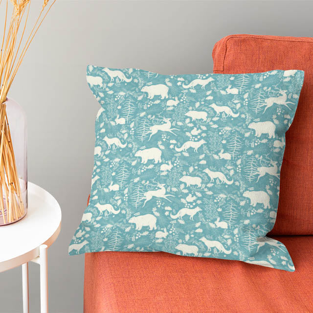 Teal linen fabric with charming forest creatures design, ideal for creating a whimsical woodland theme