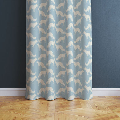 Foxy Linen Curtain Fabric - Sky Blue draping elegantly in a living room