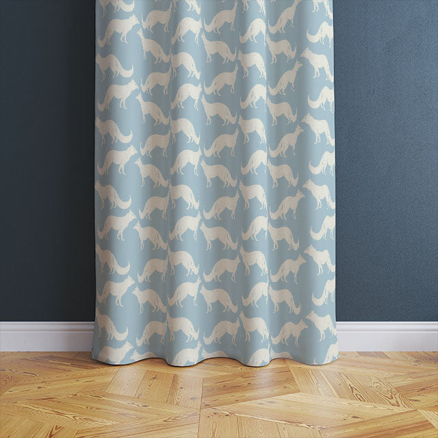 Foxy Linen Curtain Fabric - Sky Blue draping elegantly in a living room