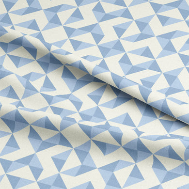 Close up of the Geometry Cotton Curtain Fabric - Sky, showcasing the intricate details of the geometric pattern and the soft texture of the fabric