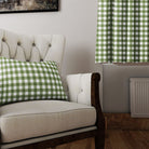 Green Gingham Check Cotton Curtain Fabric swatched against different backgrounds, demonstrating its versatile and timeless appeal