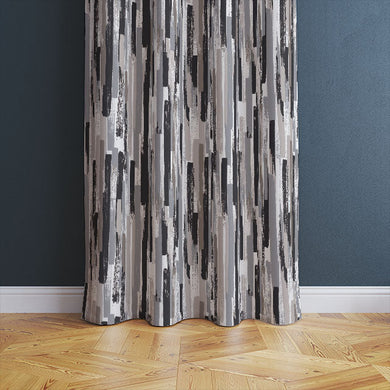 Elegant, modern charcoal Modernism Cotton Curtain Fabric draping gracefully over a window