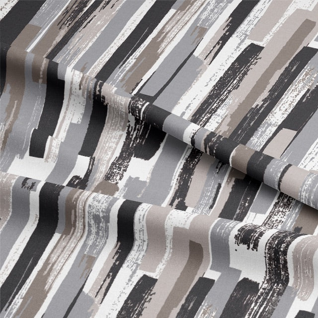 Close-up of textured charcoal Modernism Cotton Curtain Fabric in natural light