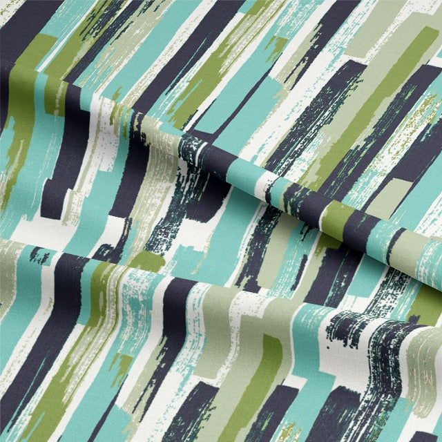 A full-length image of the Modernism Cotton Curtain Fabric - Ocean, hanging gracefully and creating a serene atmosphere in the room