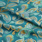 Teal colored cotton fabric with intricate mosaic design for curtains