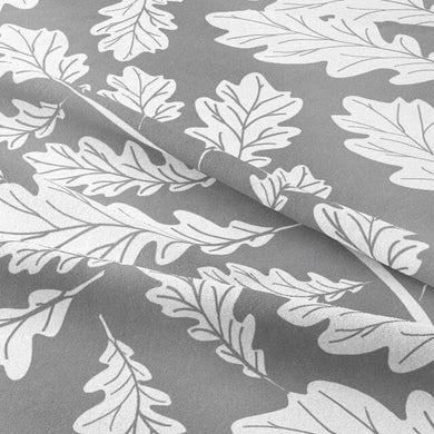Close-up of Oak Leaf Cotton Curtain Fabric in Pewter, showing its intricate detail