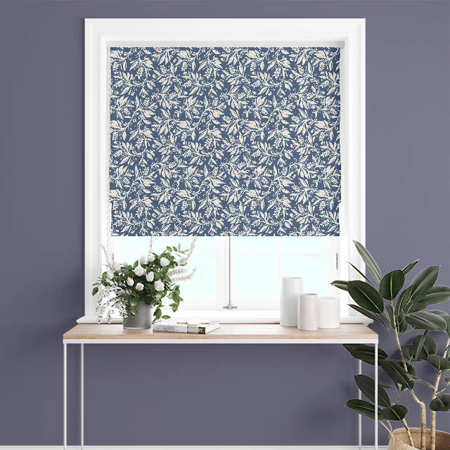 Roman blind made from Oxford Leaf Indigo fabric in white-framed window