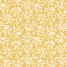 Flat lay of Oxford Leaf Ochre fabric showing cream leaf motif on yellow background