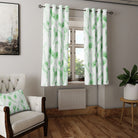 Elegant and luxurious green curtain fabric with detailed peacock feather motif