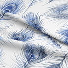 Beautiful ink-colored peacock feather patterned fabric draping as a curtain