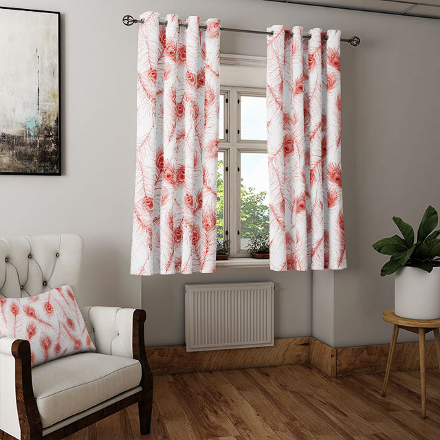 The red peacock feather cotton fabric beautifully flowing in the breeze on a sunny day