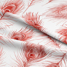 Close up of the intricate peacock feather design on the red curtain fabric