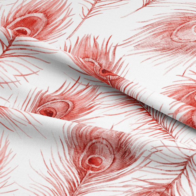 Close up of the intricate peacock feather design on the red curtain fabric