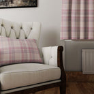 Beautiful Rannock Plaid Linen Curtain Fabric - Pink draping on a window sill