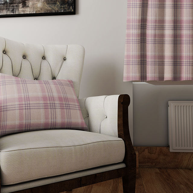 Beautiful Rannock Plaid Linen Curtain Fabric - Pink draping on a window sill