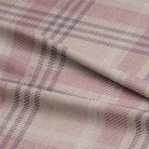 Close up of the Rannock Plaid Linen Curtain Fabric - Pink texture