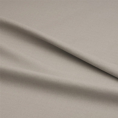 High-quality stone-colored cotton sateen fabric, perfect for curtain lining purposes