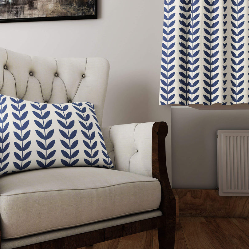 Scandi Stem Navy fabric styled as curtains and cushions in neutral lounge