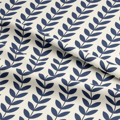 Close-up of Scandi Stem Navy linen blend fabric showing printed leaf design