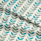 Scandi Stem Turquoise Sage fabric shown in soft folds, highlighting its movement and leaf design