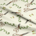 Ivory curtain fabric with Scissors & Thread Cotton for sewing projects