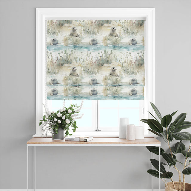 Seal Pups Cotton Curtain Fabric - Ivory draping beautifully on a window
