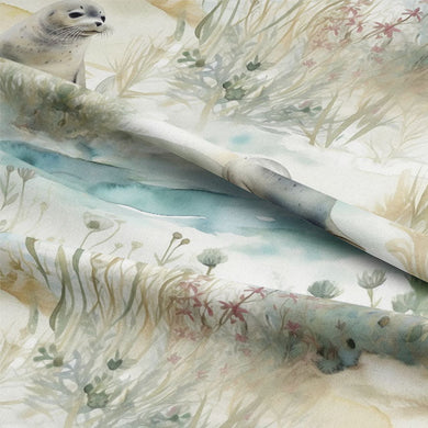 Seal Pups Cotton Curtain Fabric in Ivory, perfect for creating a soft, elegant window treatment in any room