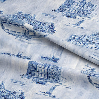  A close-up of the intricate floral pattern in blue cotton fabric 
