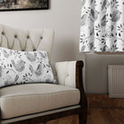 Elegant and stylish cotton curtain fabric featuring sleeping birds in a calming slate color