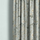 This image showcases the Spring Bloome Linen Curtain Fabric - Aqua, a soft and luxurious fabric that drapes beautifully and brings a calming, natural element to any space