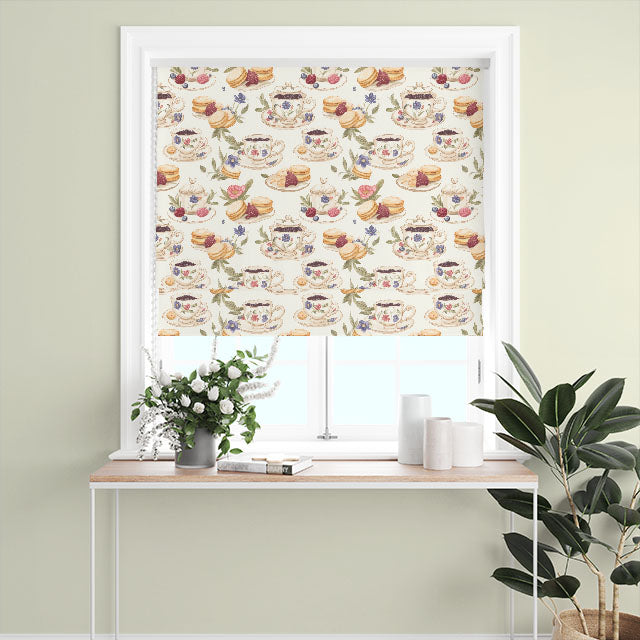 Tea & Scones Cotton Curtain Fabric in Vanilla color hanging in a room