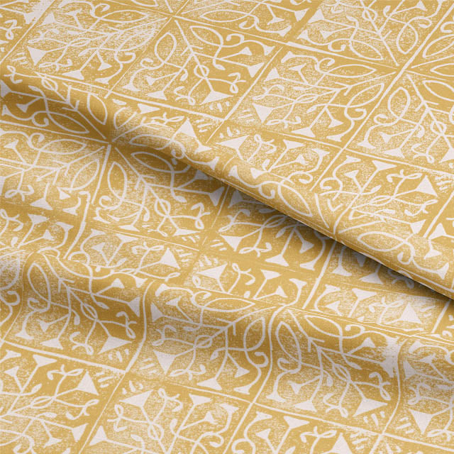  High quality Udaipur Linen Curtain Fabric - Ochre draped on a curtain rod