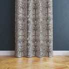 Grey Vanessa Cotton Curtain Fabric Draped in a Contemporary Living Room Setting