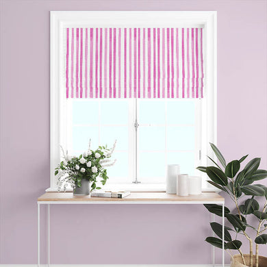 Watercolour Stripe Cotton Curtain Fabric in Cerise, hanging beautifully as window treatment