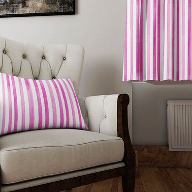 Watercolour Stripe Cotton Curtain Fabric in Cerise, adding a pop of color to a living space