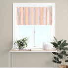 Close up of watercolour stripe cotton curtain fabric in rich henna tone