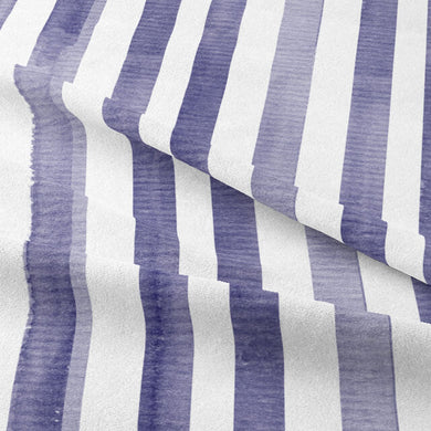 Close-up of navy blue watercolour stripe cotton curtain fabric texture