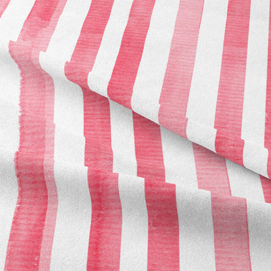 Close-up of red watercolour stripe cotton fabric for curtains or upholstery