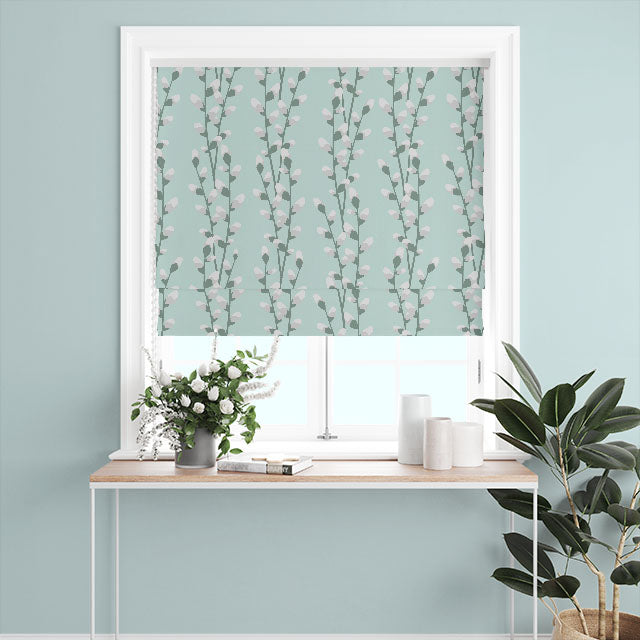 Room setting with Willow Linen Curtain Fabric in Duck Egg Blue, showcasing its elegant drape