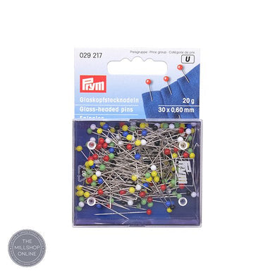Colorful Prym Glass Headed Pins in a clear plastic container for sewing and crafting projects